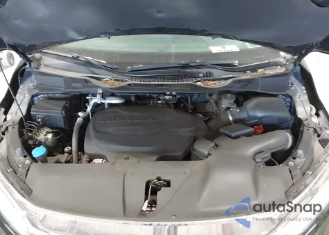 2021 Honda Odyssey Touring z USA, uszkodzony, nr VIN 5FNRL6H83MB028264